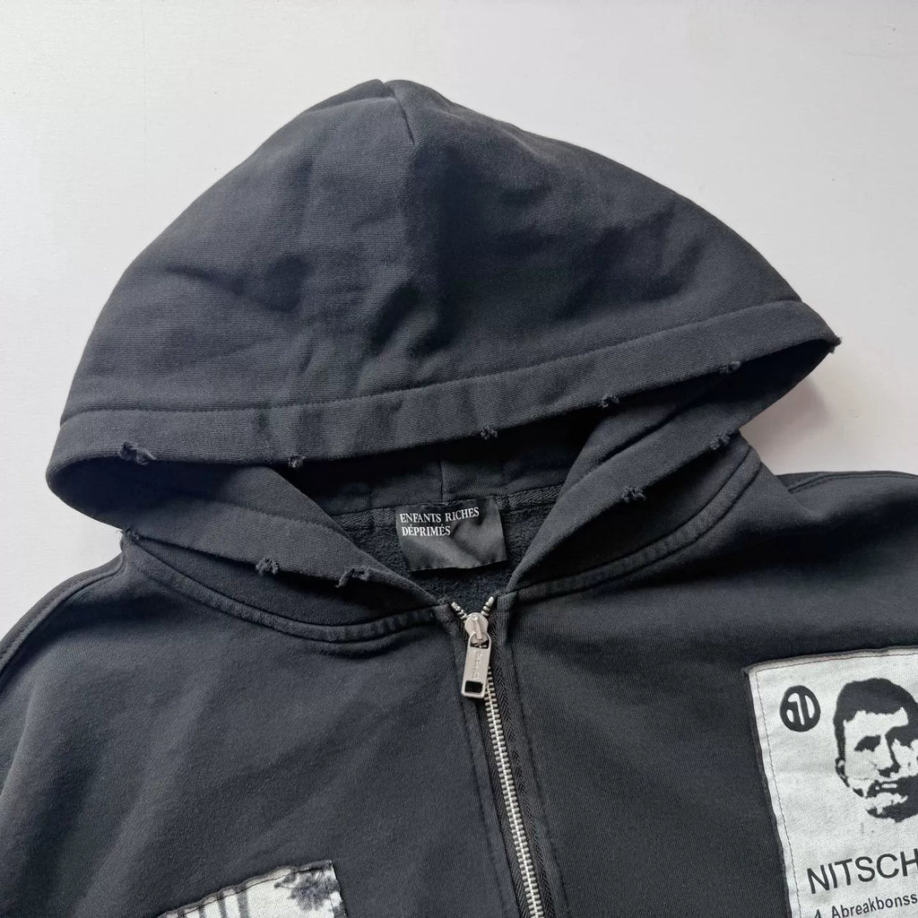 Distressed Patched Print Zip‑Up Hoodie